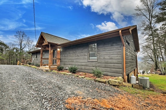 view of front of house featuring cooling unit