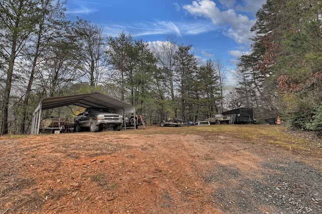 view of yard featuring a carport