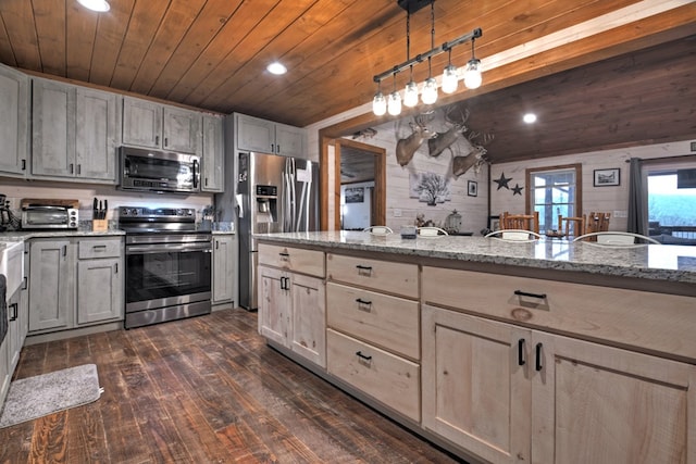 kitchen with appliances with stainless steel finishes, wooden ceiling, light stone counters, and pendant lighting