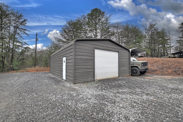 garage with a carport