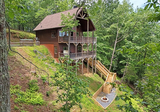 73 Rosiey Ln, Blue Ridge, GA 30513 - back of house with stairway, a deck, and a shingled roof