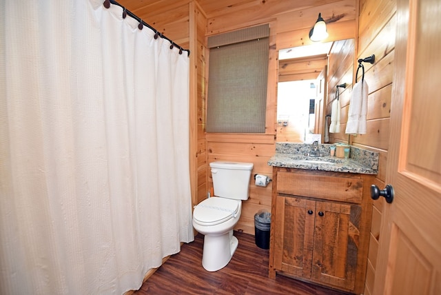 73 Rosiey Ln, Blue Ridge, GA 30513 - full bathroom with wood finished floors, vanity, wood walls, and a shower with shower curtain