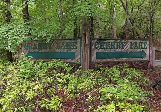 73 Rosiey Ln, Blue Ridge, GA 30513 - community / neighborhood sign featuring a wooded view