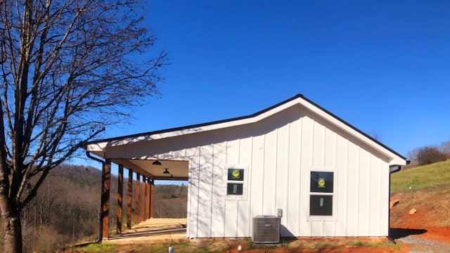 view of home's exterior with cooling unit