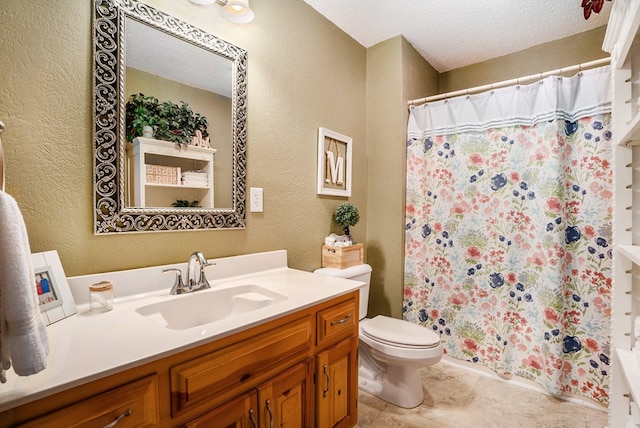 bathroom with tile patterned flooring, a shower with shower curtain, vanity, a textured ceiling, and toilet