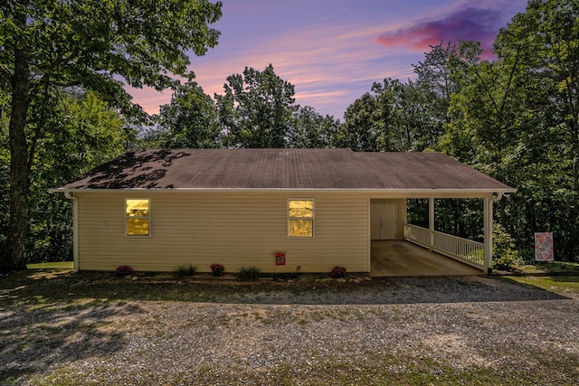 view of front of house with a carport