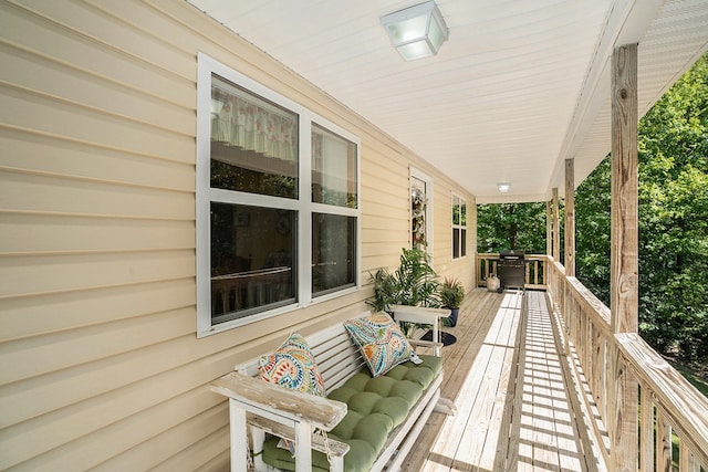 wooden deck with area for grilling