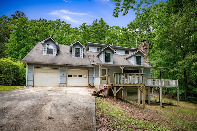 15.20 Piney Acres Rd, Blue Ridge, GA 30513 - view of front of home with a chimney and driveway