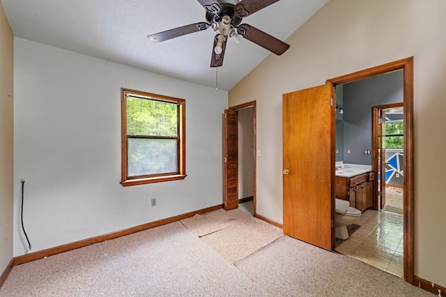 15.20 Piney Acres Rd, Blue Ridge, GA 30513 - unfurnished bedroom featuring light carpet, multiple windows, baseboards, vaulted ceiling, and a sink