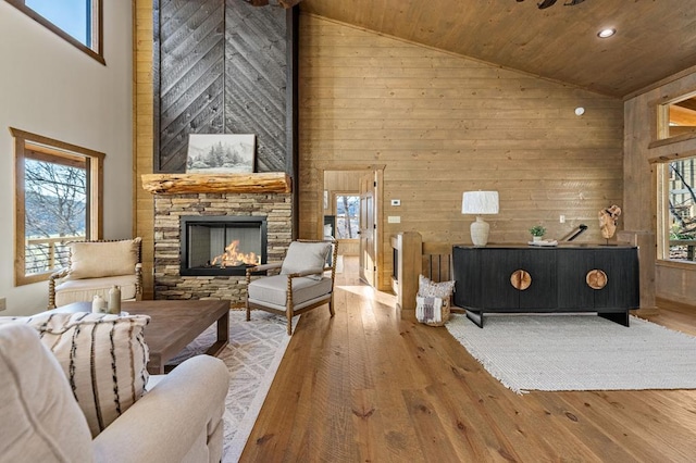LOT11 Windy Valley Trl, Blue Ridge, GA 30513 - living room featuring high vaulted ceiling, wooden walls, hardwood / wood-style floors, wooden ceiling, and a stone fireplace