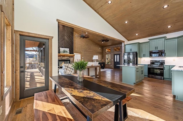 LOT11 Windy Valley Trl, Blue Ridge, GA 30513 - dining space featuring high vaulted ceiling, ceiling fan, a fireplace, recessed lighting, and dark wood-style flooring