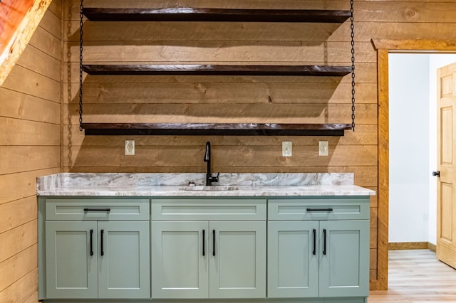LOT11 Windy Valley Trl, Blue Ridge, GA 30513 - bar with a sink, wooden walls, light wood finished floors, and baseboards