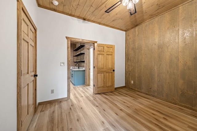 LOT11 Windy Valley Trl, Blue Ridge, GA 30513 - spare room featuring ceiling fan, wood ceiling, light wood-style flooring, wood walls, and baseboards