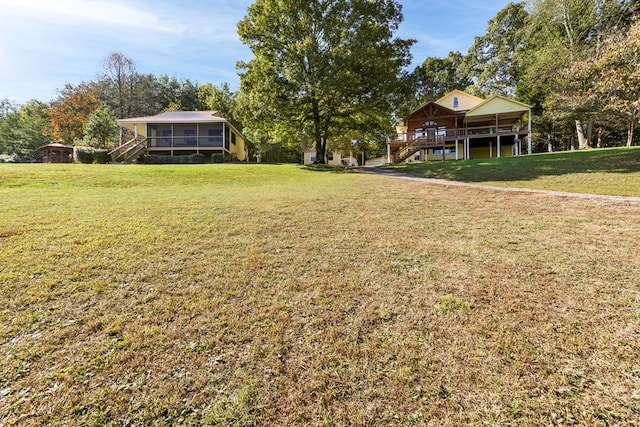 view of yard featuring a deck