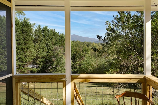 wooden deck featuring a mountain view