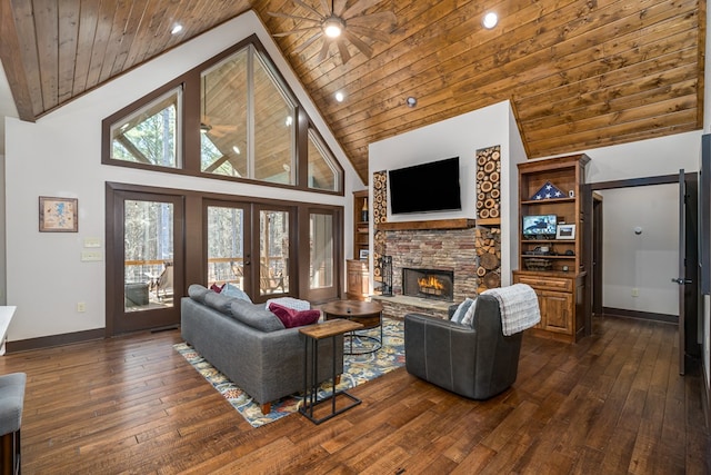 living room with dark wood-style floors, french doors, a fireplace, and wood ceiling