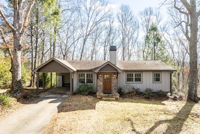 single story home with a carport