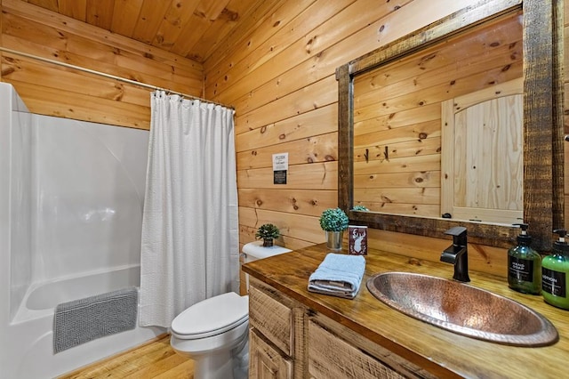 full bathroom featuring shower / bathtub combination with curtain, wood ceiling, wooden walls, vanity, and toilet