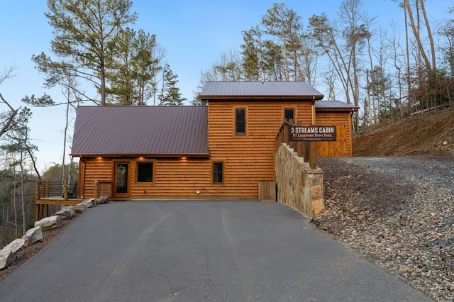 view of log cabin