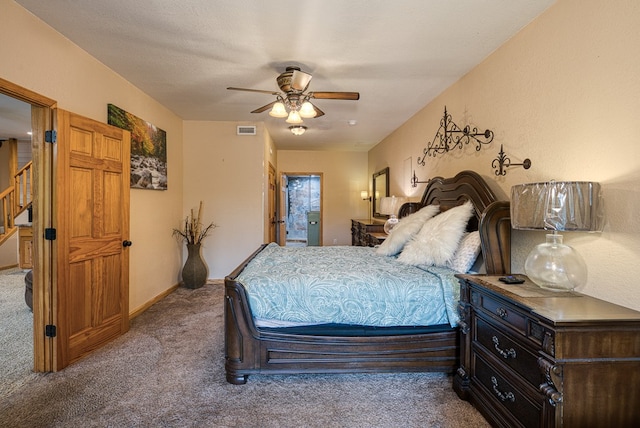 bedroom featuring carpet floors, ceiling fan, and visible vents