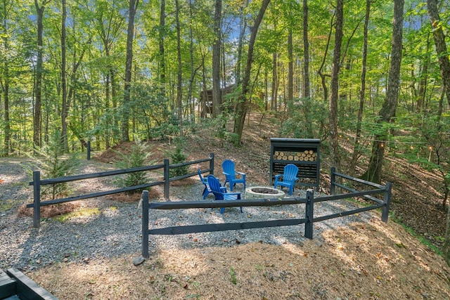 exterior space featuring an outdoor fire pit