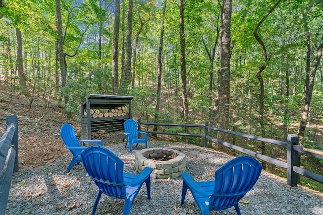 view of patio with a fire pit