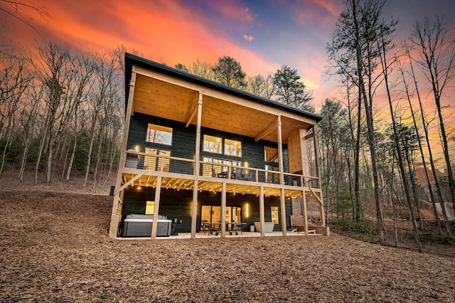 back of house featuring a patio