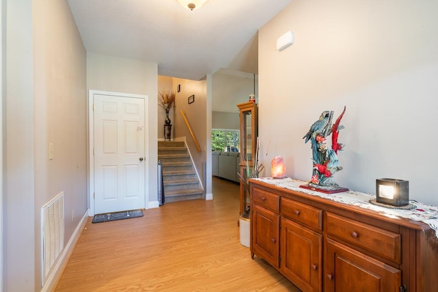 hallway featuring light hardwood / wood-style flooring