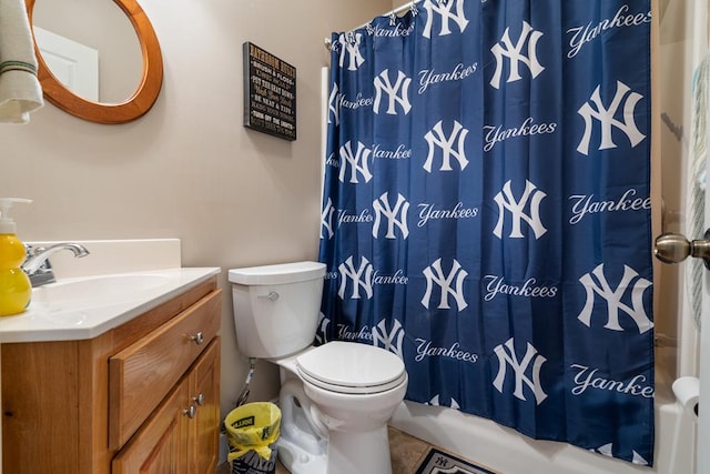 full bathroom featuring shower / tub combo, tile patterned floors, vanity, and toilet