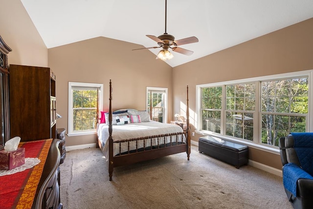 carpeted bedroom with high vaulted ceiling and ceiling fan