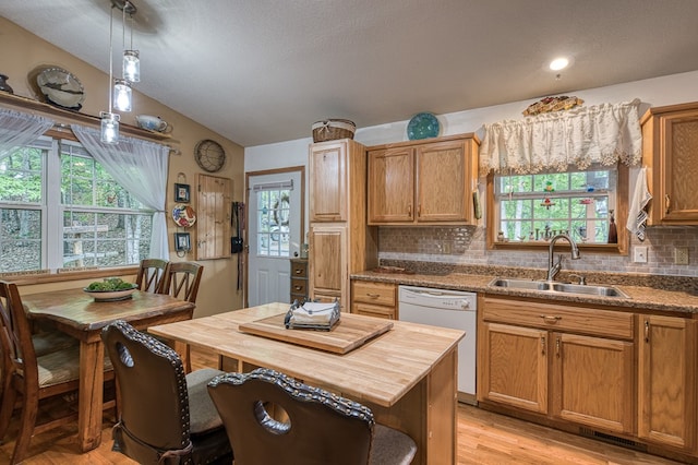 243 Havenwood Ln, Murphy, NC 28906 - kitchen featuring a sink, wooden counters, white dishwasher, backsplash, and healthy amount of natural light