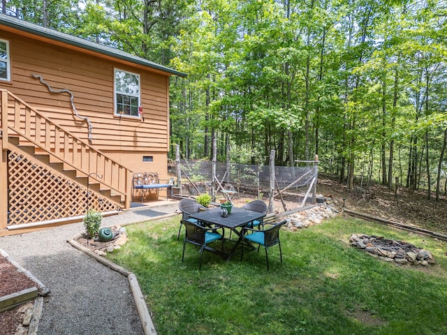 243 Havenwood Ln, Murphy, NC 28906 - view of green lawn featuring stairs, a patio, and outdoor dining area