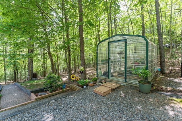 243 Havenwood Ln, Murphy, NC 28906 - view of greenhouse with a wooded view