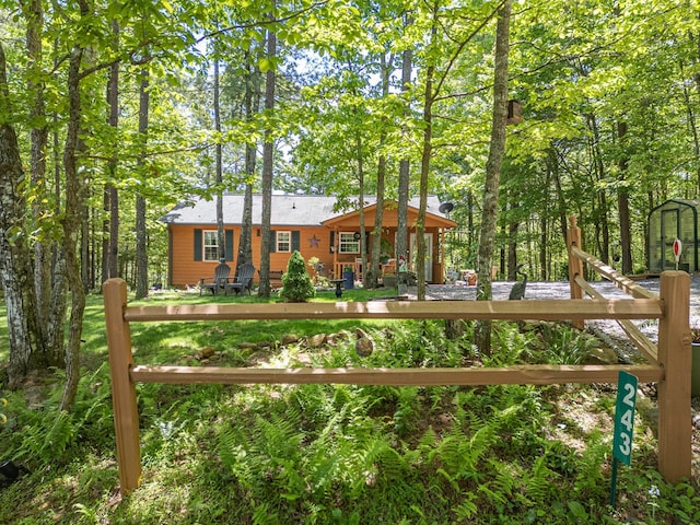 243 Havenwood Ln, Murphy, NC 28906 - back of property featuring a storage unit and an outbuilding