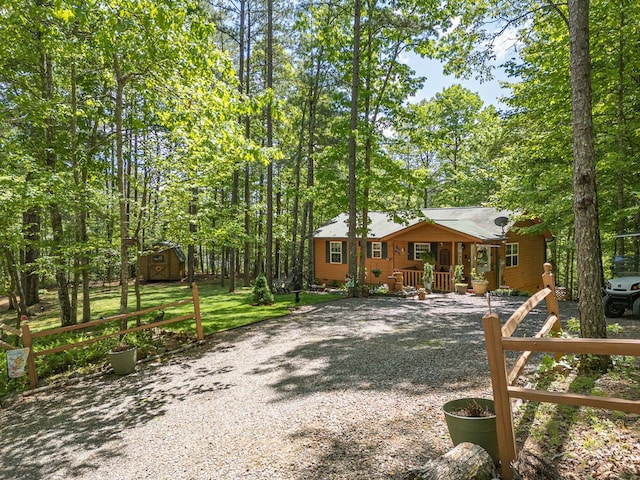 243 Havenwood Ln, Murphy, NC 28906 - view of front of property featuring a storage unit, an outbuilding, and driveway