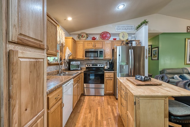 243 Havenwood Ln, Murphy, NC 28906 - kitchen featuring appliances with stainless steel finishes, a sink, lofted ceiling, wood counters, and light wood finished floors