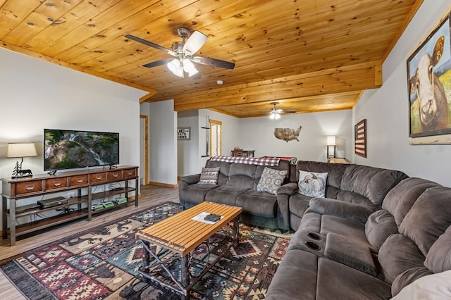 living room featuring baseboards, wood ceiling, wood finished floors, and a ceiling fan