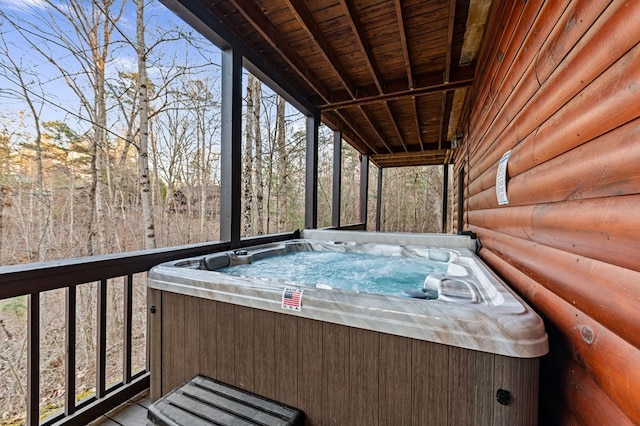 deck with a hot tub