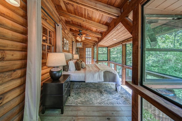 unfurnished bedroom with wood ceiling, wood-type flooring, rustic walls, and lofted ceiling with beams