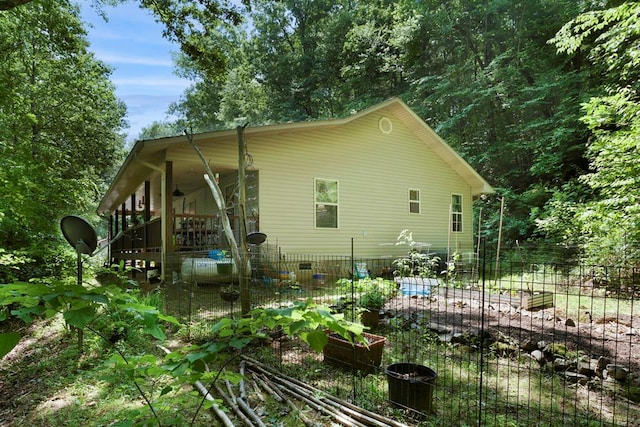 49 Hampton Ln, Hayesville, NC 28904 - rear view of house with a vegetable garden