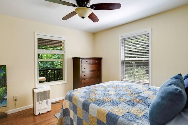 49 Hampton Ln, Hayesville, NC 28904 - bedroom with wood finished floors, baseboards, and ceiling fan