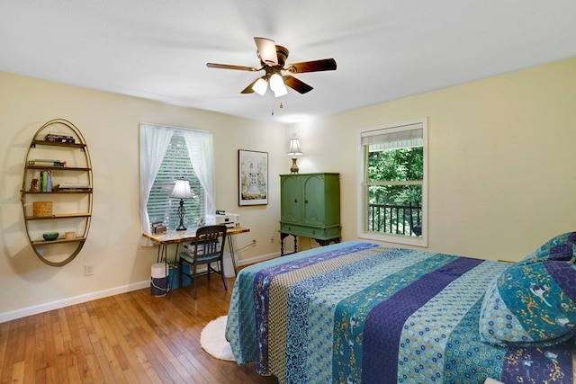 49 Hampton Ln, Hayesville, NC 28904 - bedroom with hardwood / wood-style floors, baseboards, and ceiling fan