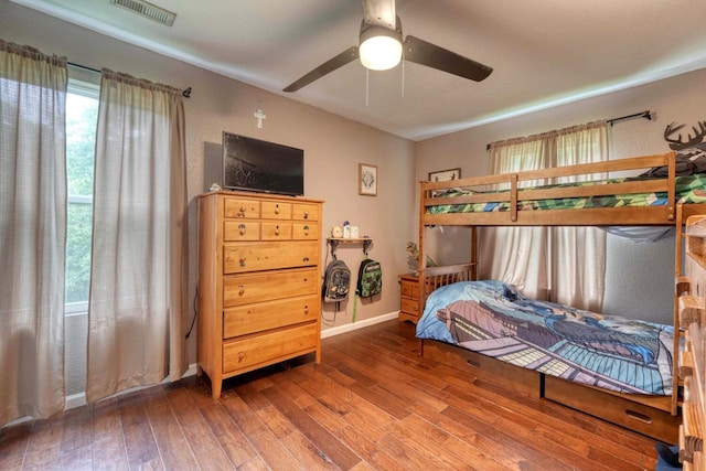 bedroom featuring ceiling fan and wood-type flooring