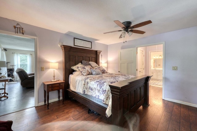 bedroom featuring a textured ceiling, ceiling fan, and dark wood-type flooring