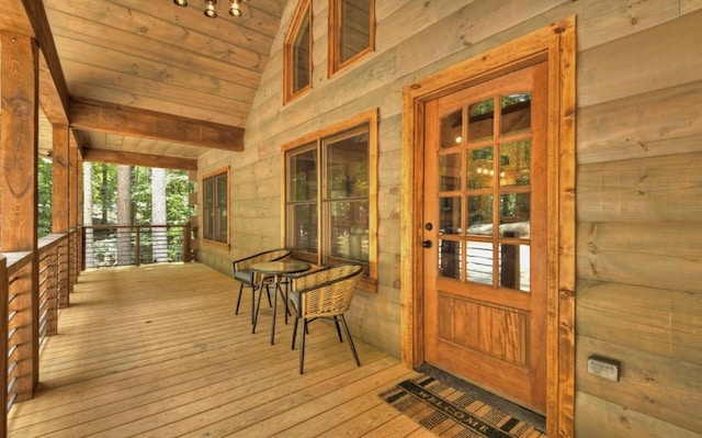 wooden terrace with covered porch