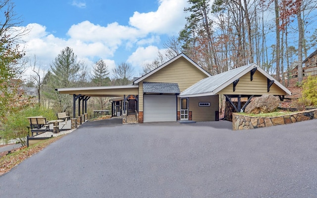 view of front of home featuring a carport