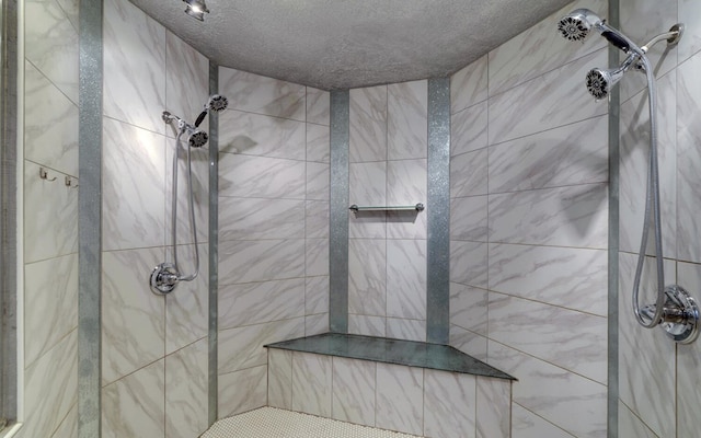 bathroom with tiled shower