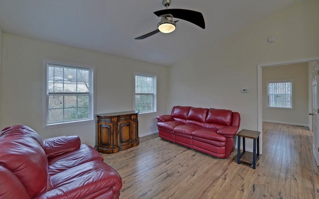 living room featuring light hardwood / wood-style floors, plenty of natural light, and ceiling fan