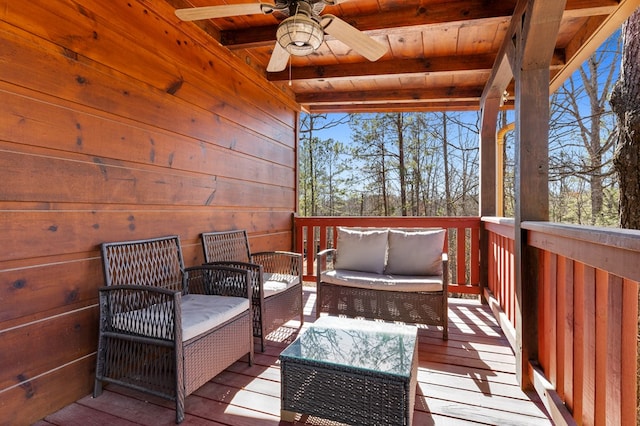 deck with ceiling fan and an outdoor hangout area