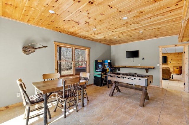 rec room featuring light tile patterned floors and wood ceiling